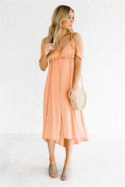 Channel Your Inner Goddess with the Peachy Talisman Midi Dress